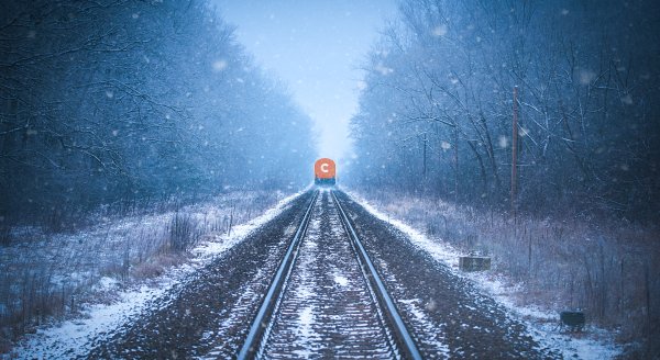 Train tracks in winter mist