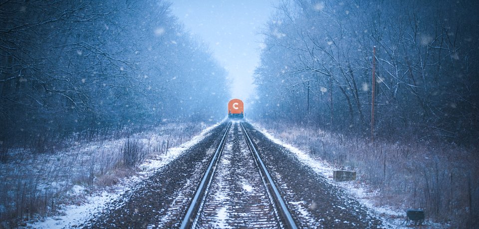 Train tracks in winter mist